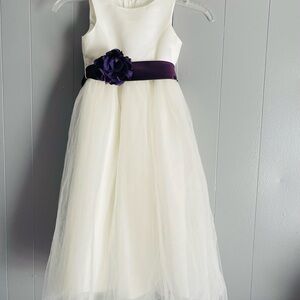 David's Bridal Cream and Purple Kids Dress